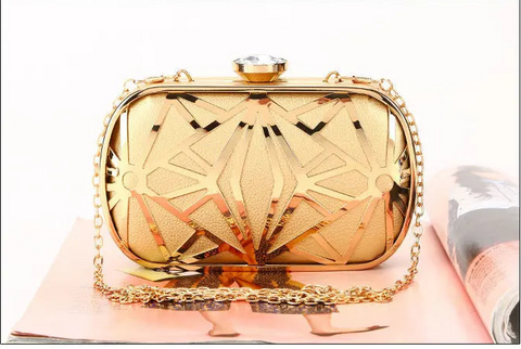 https://rario10.com.br/products/bolsa-clutch-millena-dourada