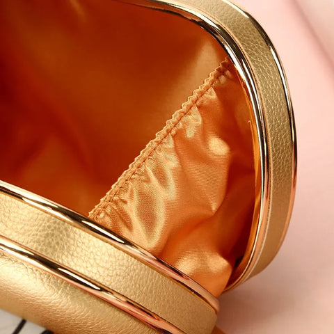 https://rario10.com.br/products/bolsa-clutch-millena-dourada