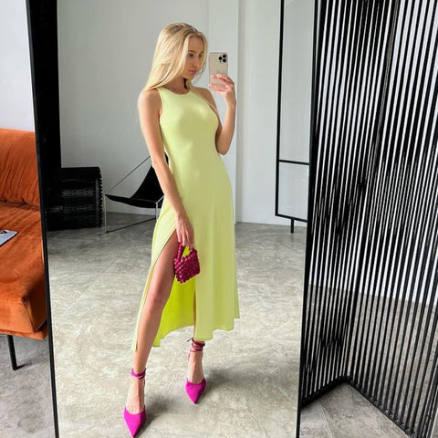 https://rario10.com.br/products/vestido-feminino-midi-de-malha-com-abertura-lateral?variant=41613616676954