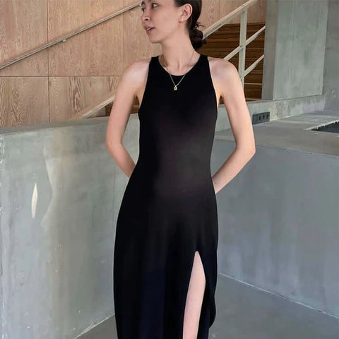 https://rario10.com.br/products/vestido-feminino-midi-de-malha-com-abertura-lateral?variant=41613616676954