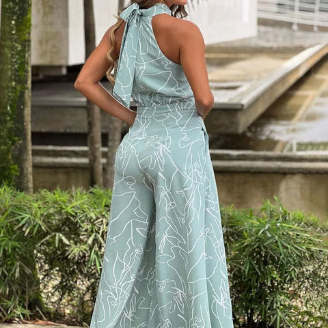 https://rario10.com.br/products/macacao-feminino-elegante-estampado-cintura-alta?variant=41604592336986