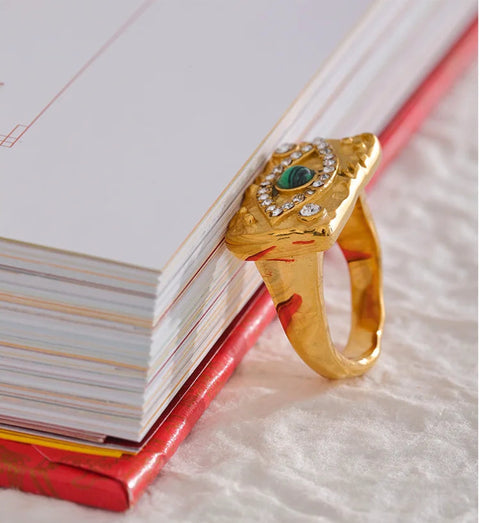 https://rario10.com.br/products/anel-dourado-com-olhar-central-verde-316l-em-aco-inoxidavel?_pos=1&_sid=d6c032fe4&_ss=r