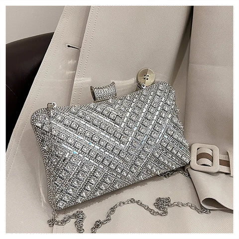 https://rario10.com.br/products/bolsa-clutch-luxo-dourada-e-prata?_pos=1&_sid=392950984&_ss=r&variant=41900621332570