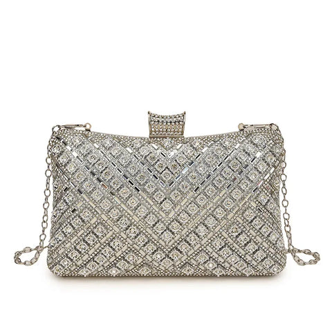 https://rario10.com.br/products/bolsa-clutch-luxo-dourada-e-prata?_pos=1&_sid=392950984&_ss=r&variant=41900621332570
