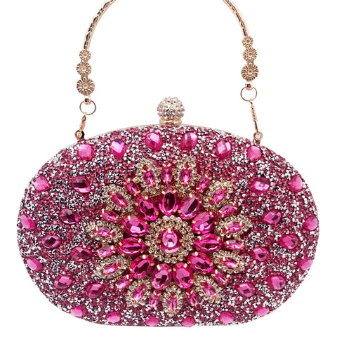 https://rario10.com.br/products/bolsa-clutch-redonda-dourada-de-luxo-com-diamantes?_pos=1&_sid=b9355f31d&_ss=r&variant=41901961609306