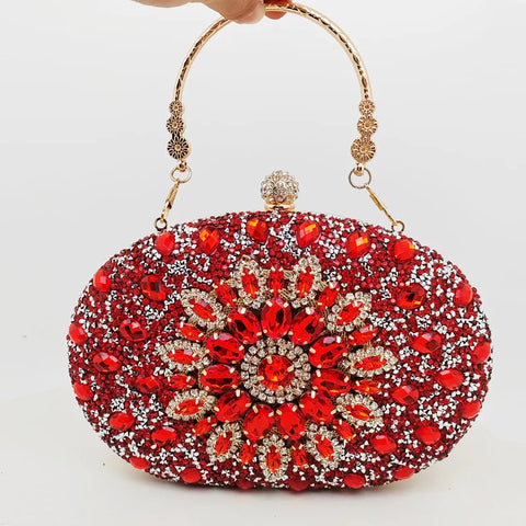 https://rario10.com.br/products/bolsa-clutch-redonda-dourada-de-luxo-com-diamantes?_pos=1&_sid=b9355f31d&_ss=r&variant=41901961609306