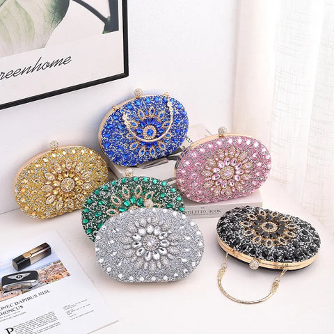 https://rario10.com.br/products/bolsa-clutch-redonda-dourada-de-luxo-com-diamantes?_pos=1&_sid=b9355f31d&_ss=r&variant=41901961609306