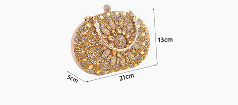 https://rario10.com.br/products/bolsa-clutch-redonda-dourada-de-luxo-com-diamantes?_pos=1&_sid=b9355f31d&_ss=r&variant=41901961609306