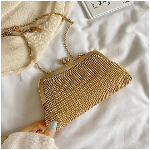 https://rario10.com.br/products/bolsa-clutch-de-mao-dourada