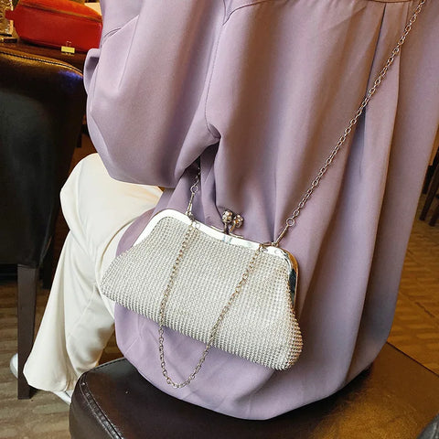 https://rario10.com.br/products/bolsa-clutch-de-mao-dourada