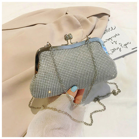https://rario10.com.br/products/bolsa-clutch-de-mao-dourada