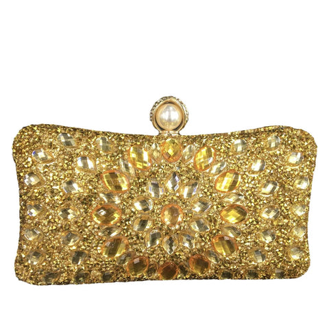 https://rario10.com.br/products/bolsas-e-clutches-femininas-douradas-com-fecho-de-perola-sintetica?_pos=1&_sid=d15e5f986&_ss=r&variant=41905656463450