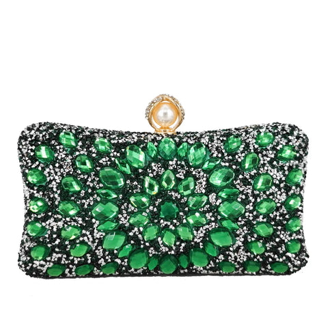 https://rario10.com.br/products/bolsas-e-clutches-femininas-douradas-com-fecho-de-perola-sintetica?_pos=1&_sid=d15e5f986&_ss=r&variant=41905656463450