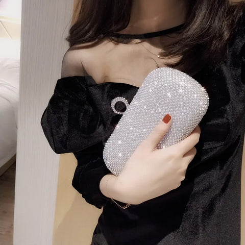https://rario10.com.br/products/bolsa-feminina-com-diamantes-aurora-breeze-para-festas?_pos=1&_sid=3236a96e2&_ss=r