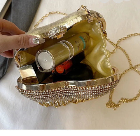https://rario10.com.br/products/bolsa-feminina-coracao-e-diamantes-sophia-mist?_pos=1&_sid=e357c9026&_ss=r
