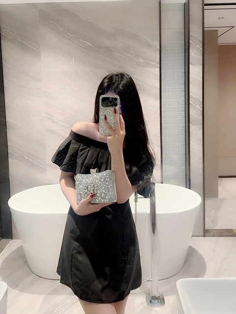 https://rario10.com.br/products/bolsa-clutch-com-brilhante-cara-willow