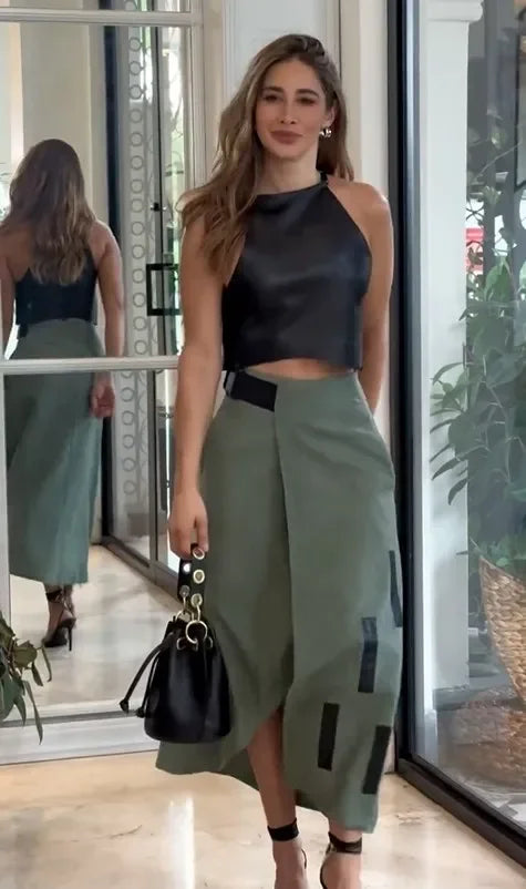 https://rario10.com.br/products/conjunto-em-pu-couro-colete-sem-mangas-e-saia-feminina?_pos=1&_sid=db6475130&_ss=r