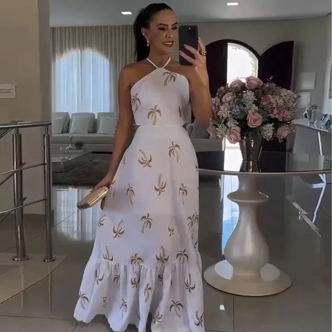https://rario10.com.br/products/vestido-feminino-longo-estampado-de-coqueiro?variant=41604631330906